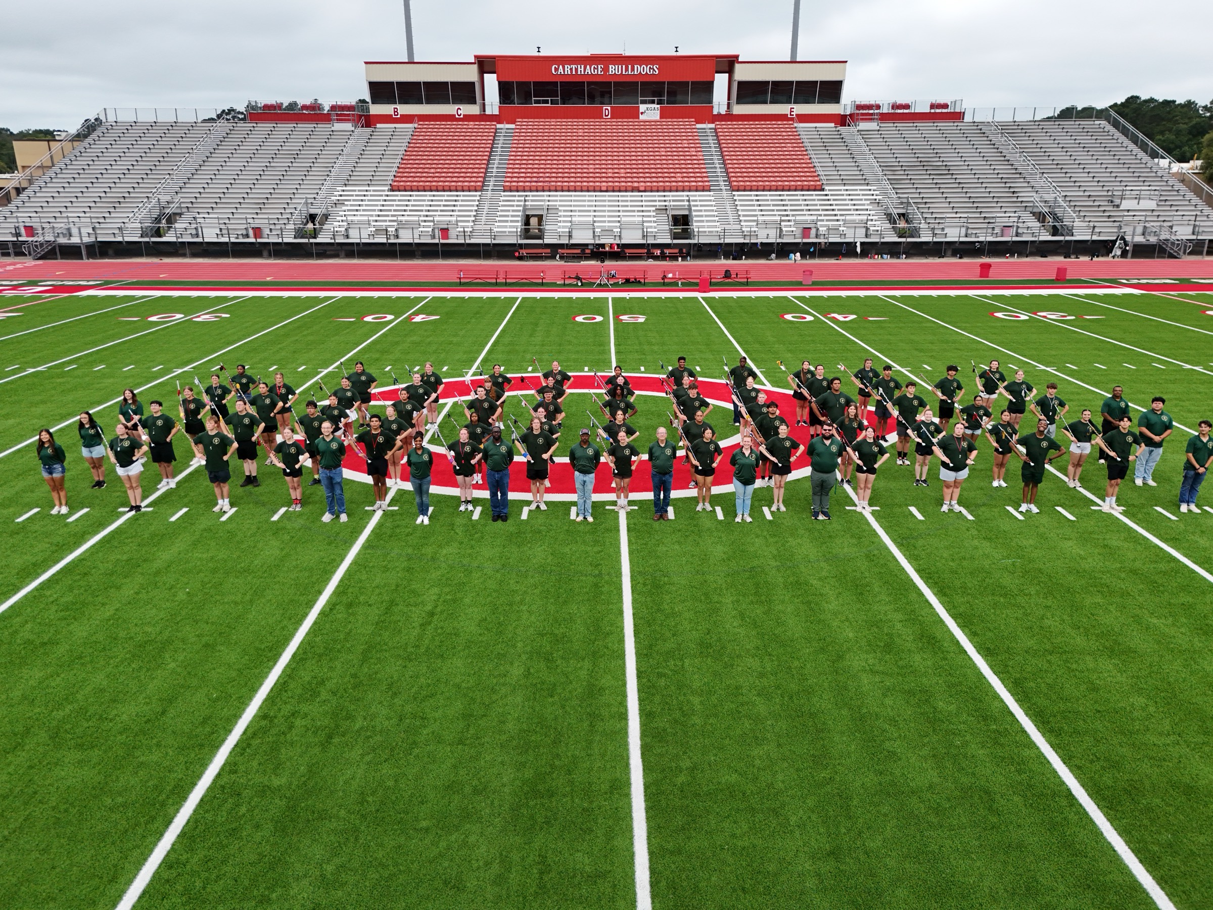 Drum majors on the field at the Panola College Military Drum Major Camp